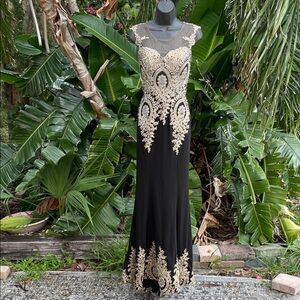 sheer mesh gold embroidery, and crystal beaded trumpet gown